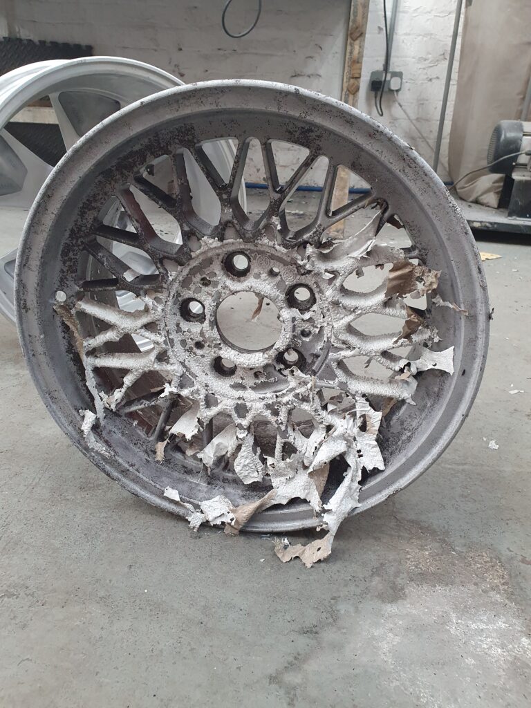 Image shows a close up of wheels that have had the paint 