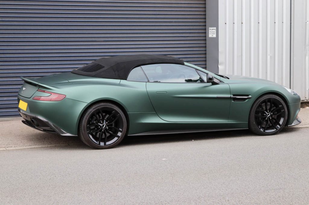 Aston Martin in Matte Green Vinyl and with Gloss Black Alloys