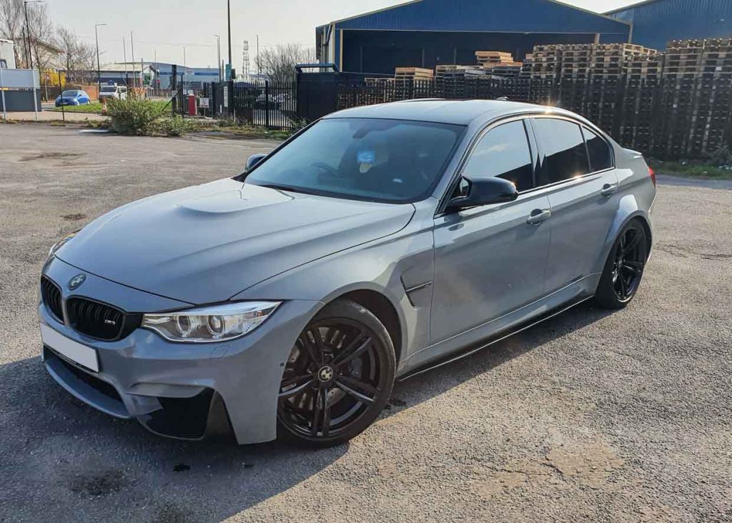 BMW M3 in Arlon Gloss Grey with gloss black alloy wheels.