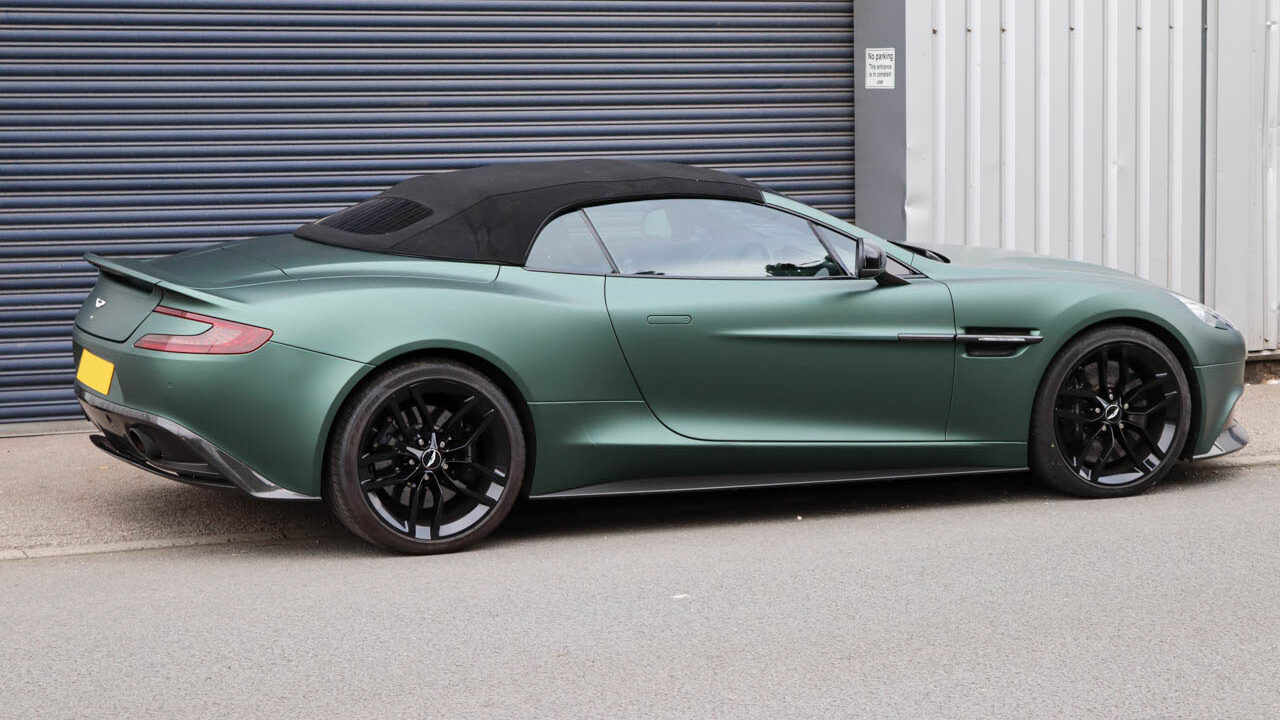 Aston Martin in Matte Green Vinyl and with Gloss Black Alloys