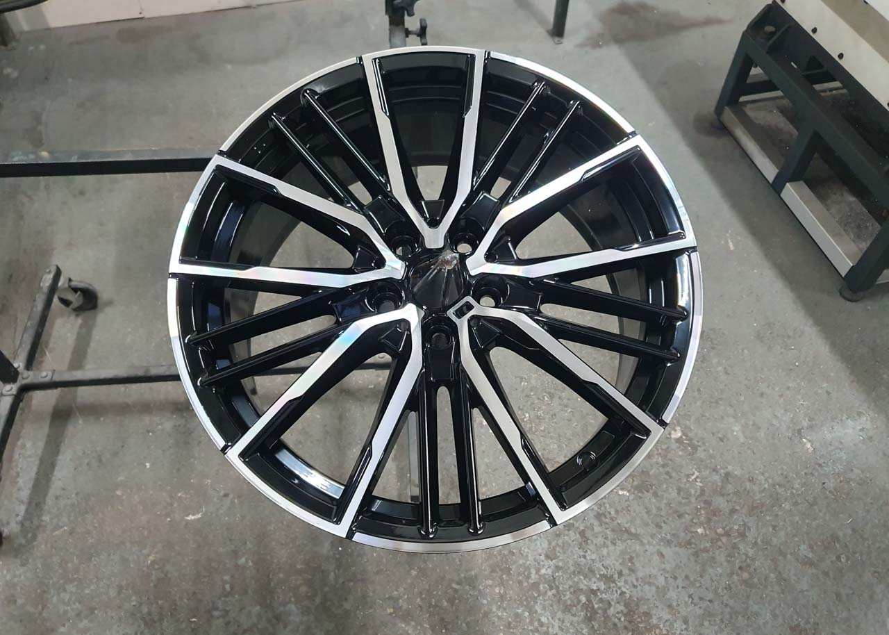 Gloss black diamond-cut alloy wheels with a two tone effect