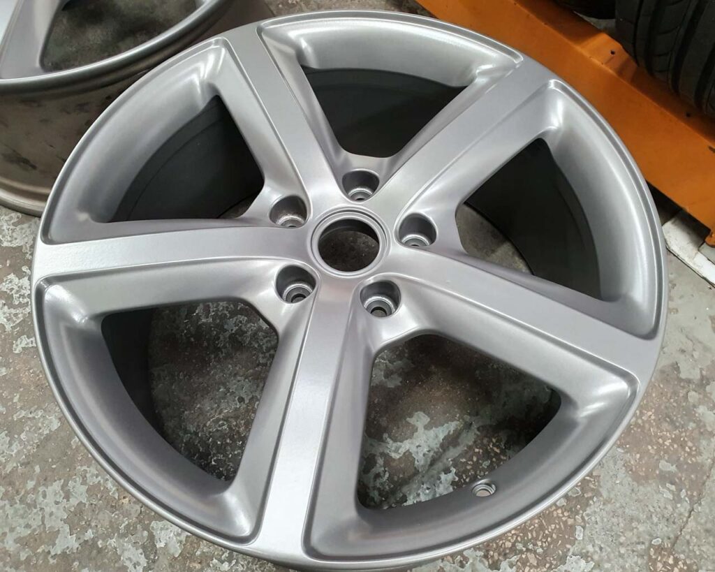 Image shows an example of a Ferrari Chrome powder coated wheels