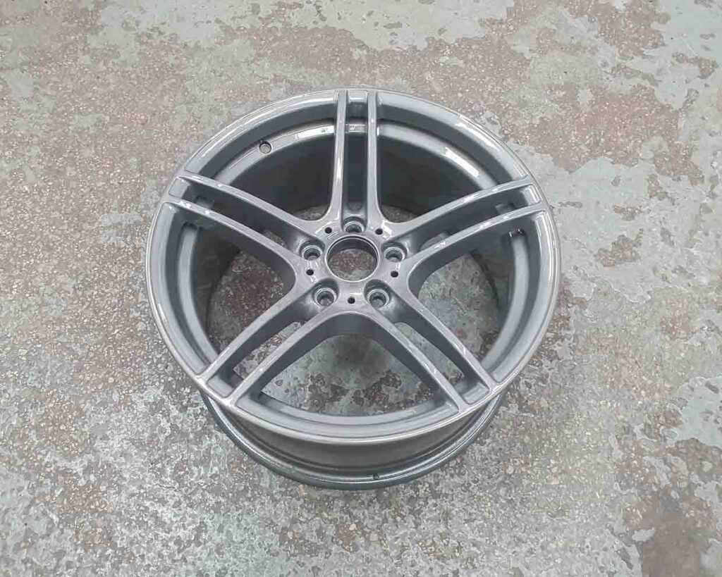 Image shows an example of a Ferrari Chrome powder coated wheels