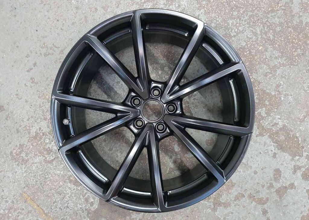 Image shows an example of a Satin Black powder coated wheels