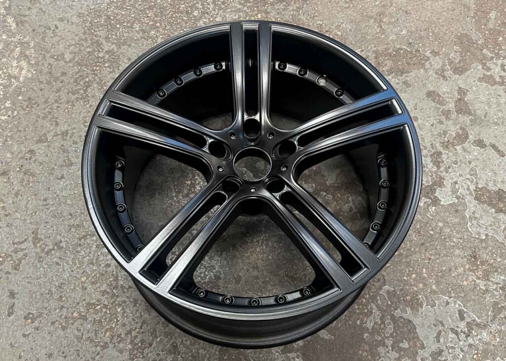 Image shows an example of a Satin Black powder coated wheels