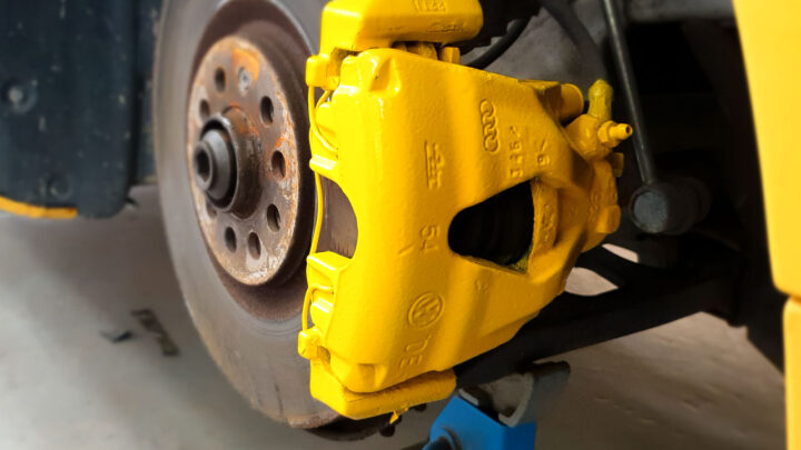 Yellow Calliper on a brake disc