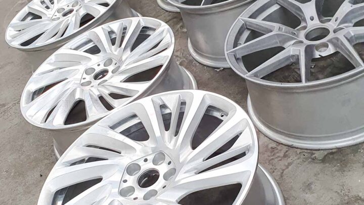 Alloy wheels that have been acid dipped and ready for going gloss black powder coated